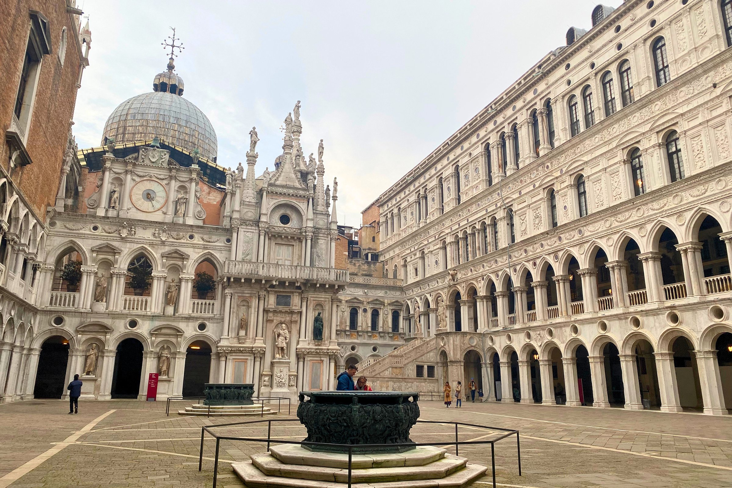 View of the inner courtyard of the Doge’s Palace in Venice, featuring ornate Renaissance and Gothic architecture.