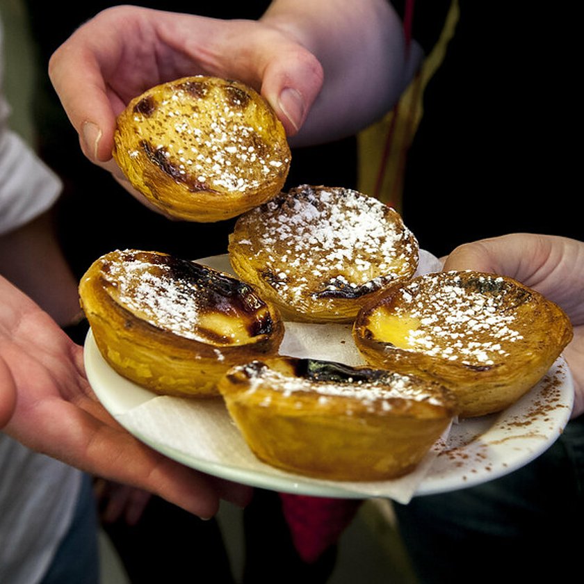 pastel de nata on a shared plate