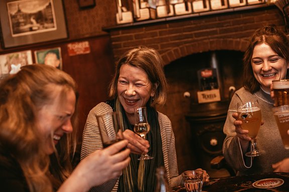 group drinking in amsterdam pub